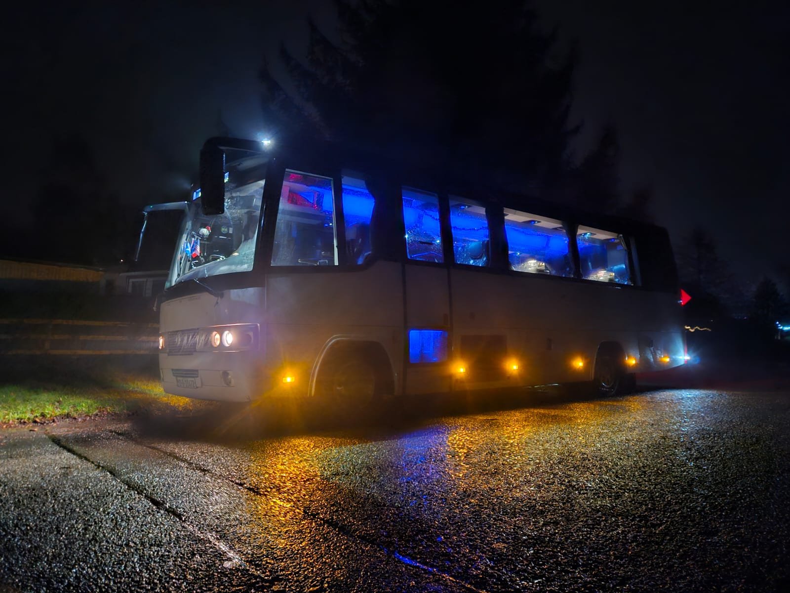 Paynes coach at night with blue interior lights