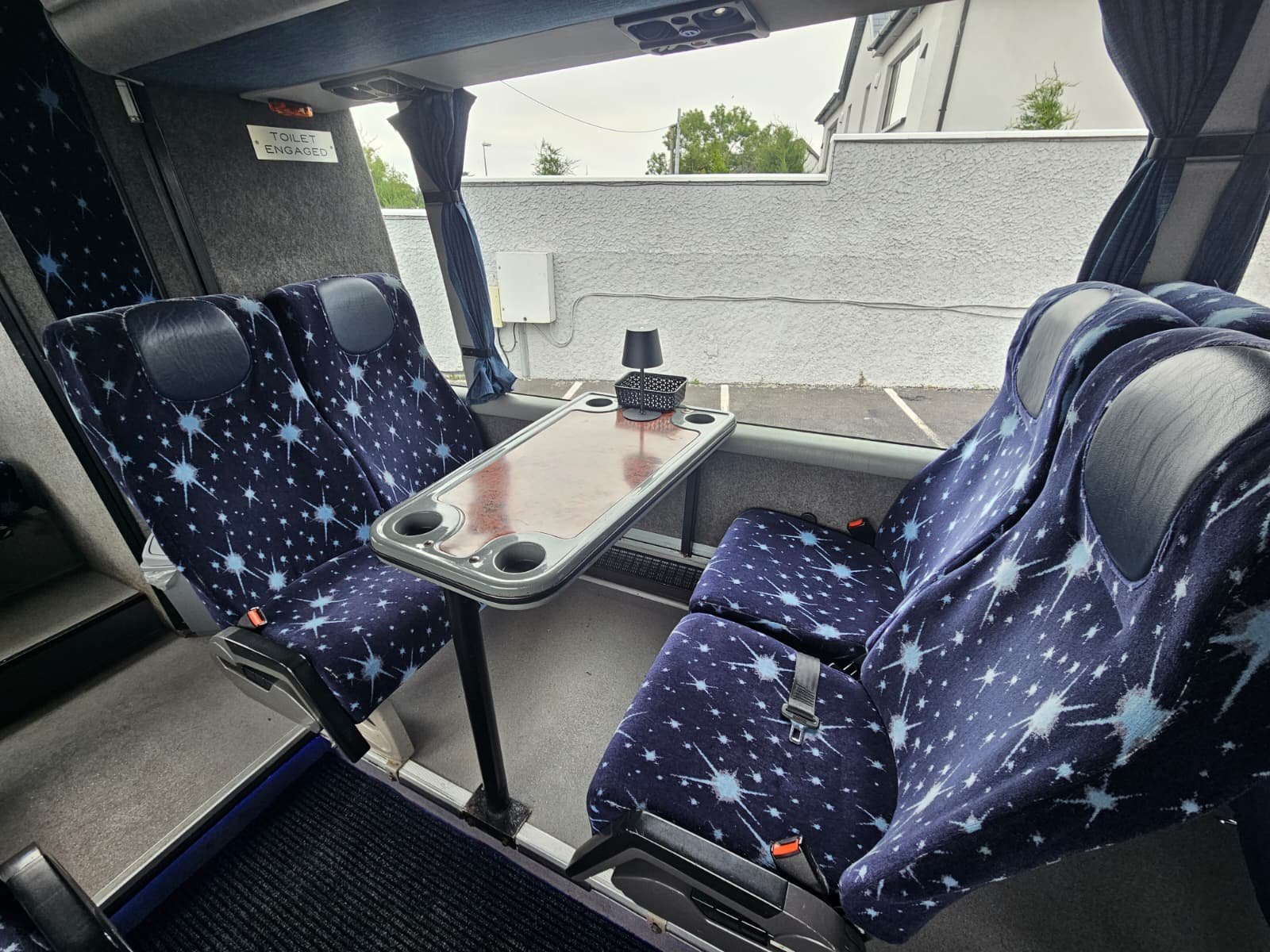 Mercedes coach at night with blue mood lighting